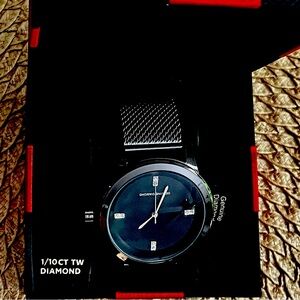 Solid black watch with 1/10 carat diamond accents. Buckle band.